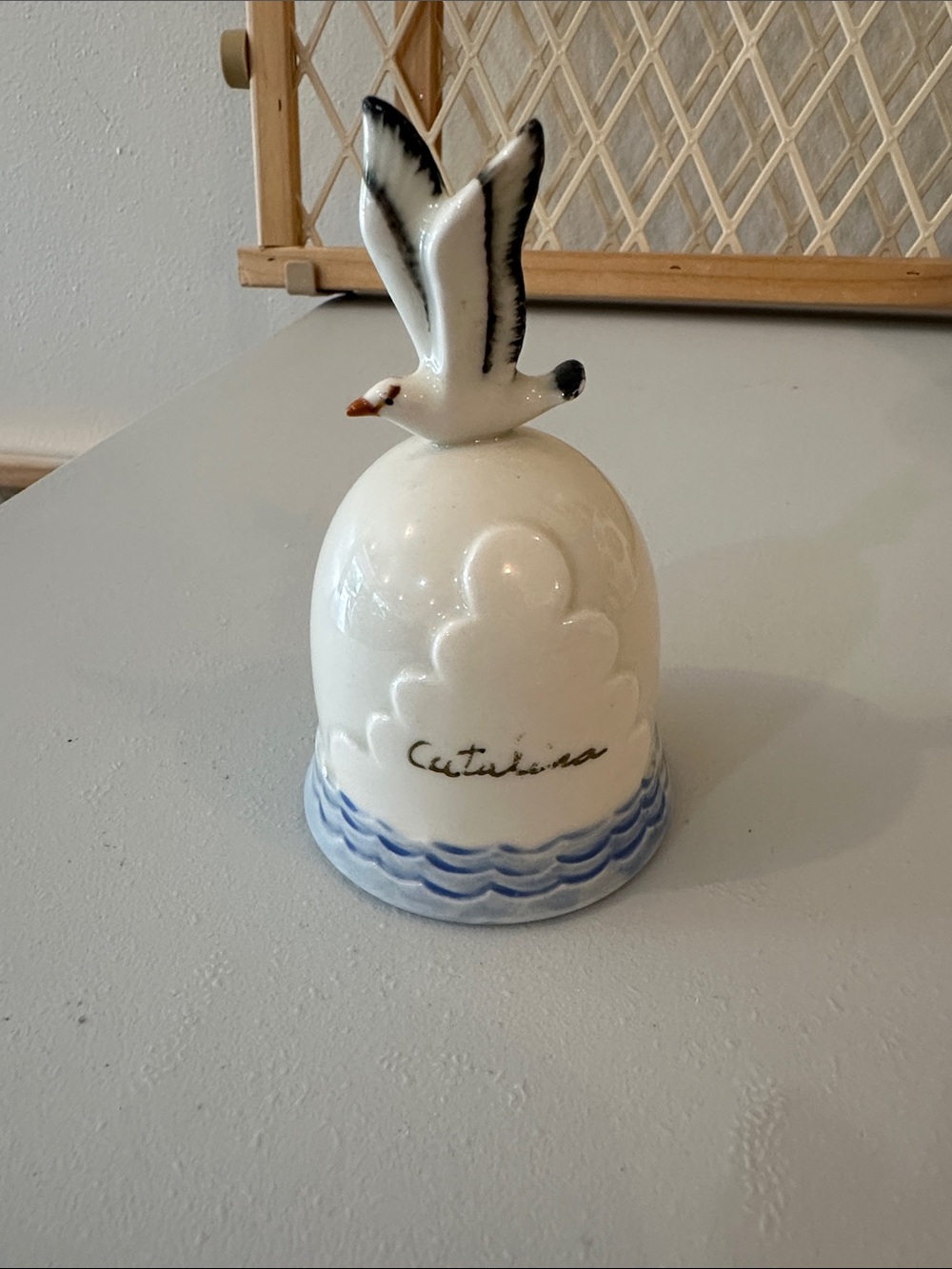 Vintage Norcrest White Ceramic Bell with Seagull Top
